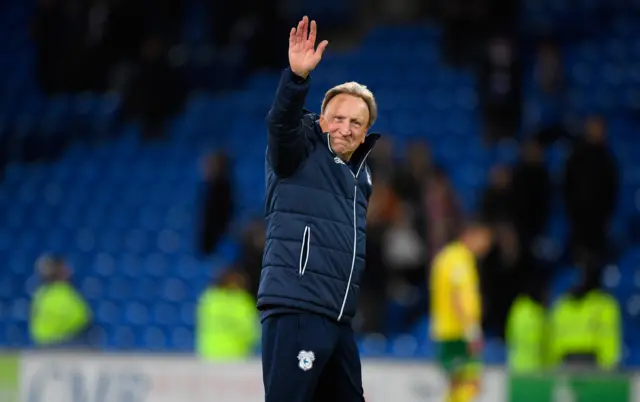 Neil Warnock waves to the Cardiff fans