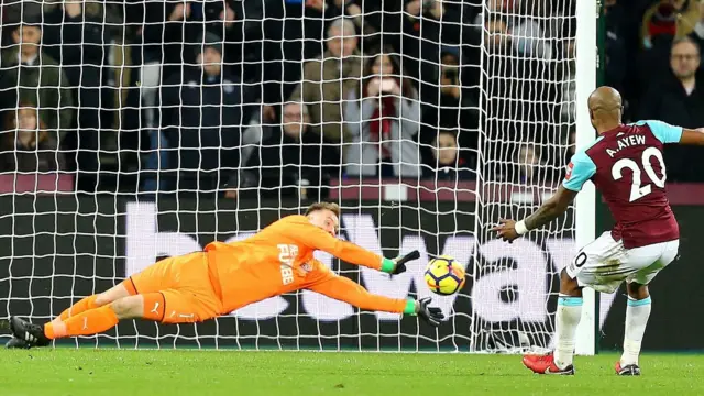 Andre Ayew and Rob Elliot