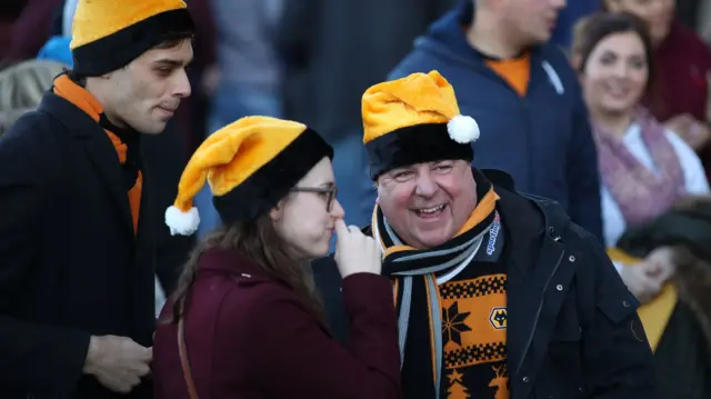 Wolves fans in Santa hats