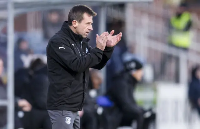 Neil McCann urges on his Dundee side