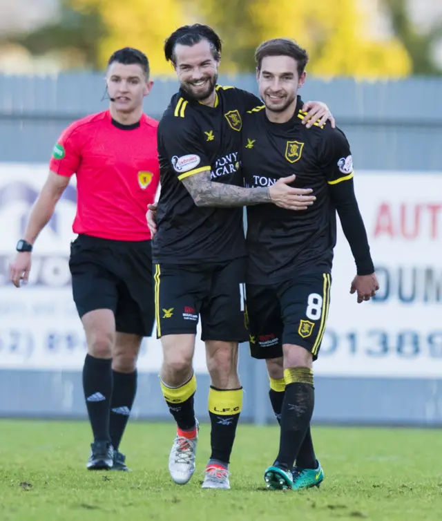 Scott Pittman (right) celebrates his goal