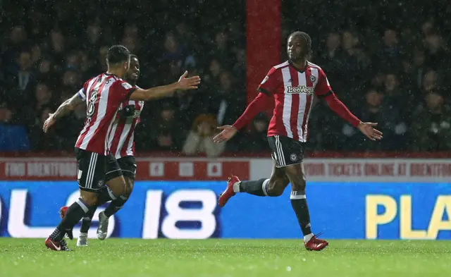 Romaine Sawyers celebrates