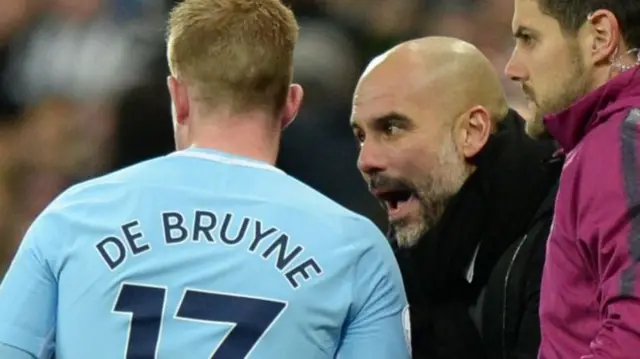 Pep Guardiola gives instructions to Kevin De Bruyne