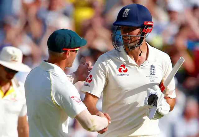 David Warner congratulates alastair Cook