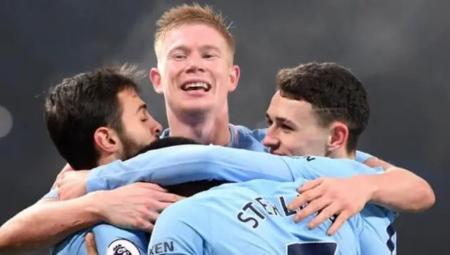 Manchester City players celebrate