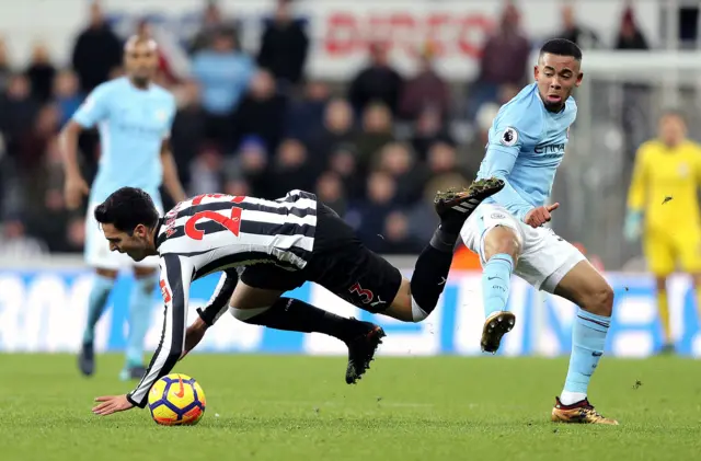 Gabriel Jesus fouls Mikel Merino