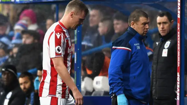 Ryan Shawcross,of Stoke City, goes off injured during the Premier League match between Huddersfield Town and Stoke City