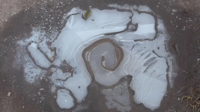 swirly ice puddle