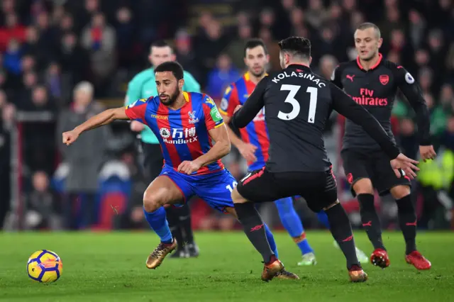 Andros Townsend with Arsenal defender Sead Kolasinac