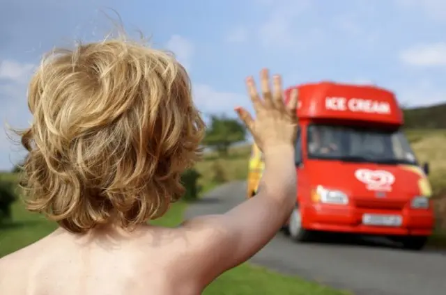 Boy trying to stop ice cream van