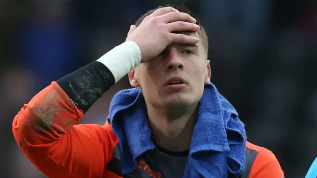 Oxford City goalkeeper Jack Stevens dejected