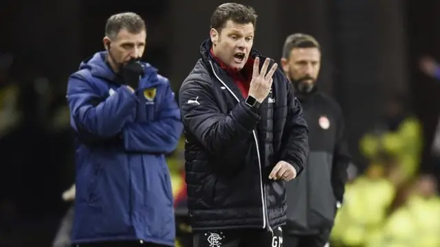 Graeme Murty makes a signal with three fingers to his side in their win over Aberdeen