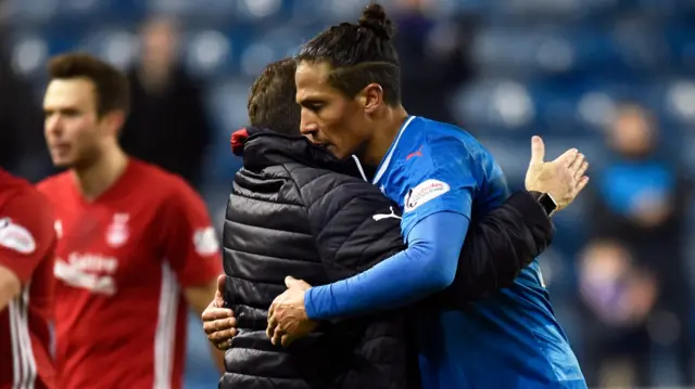 Aberdeen boss Derek McInnes hugs Rangers' Bruno Alves