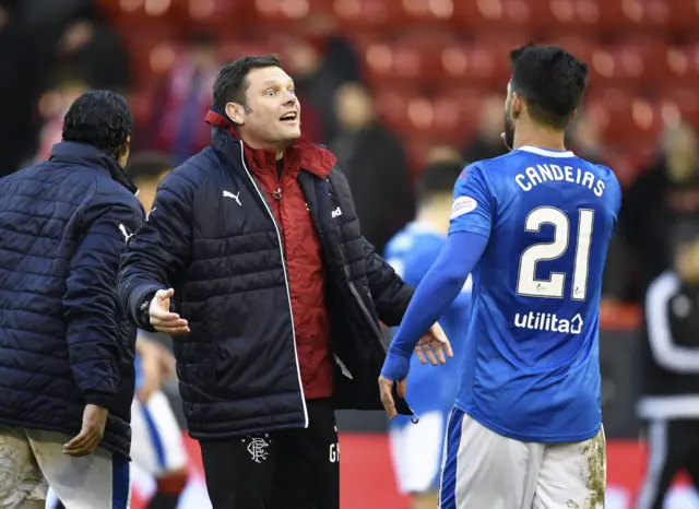 Graeme Murty celebrates with Daniel Candeias after Rangers' victory