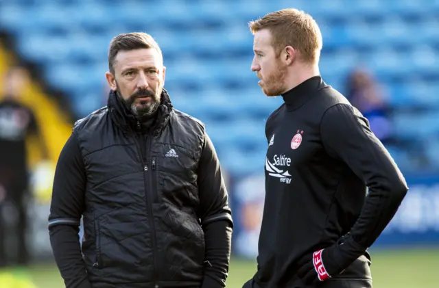 Derek McInnes talks to striker Adam Rooney