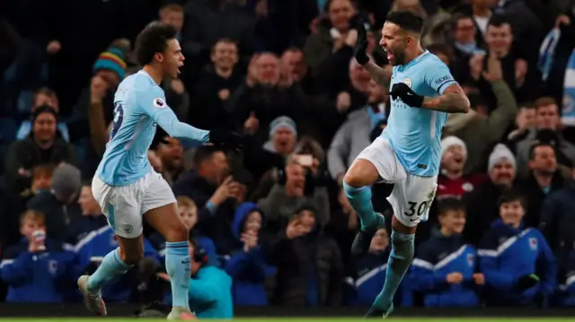 Nicolas Otamendi celebrates his goal with Leroy Sane