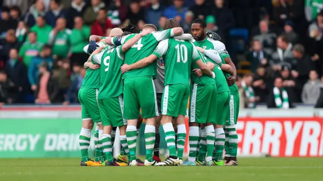 Leatherhead players in a huddle