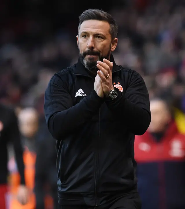 Derek McInnes applauds the Aberdeen fans after their 2-1 defeat by Rangers