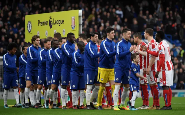 Players shake hands