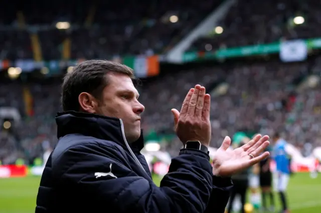 Graeme Murty applauds his Rangers team