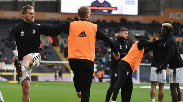 Fulham players warm up