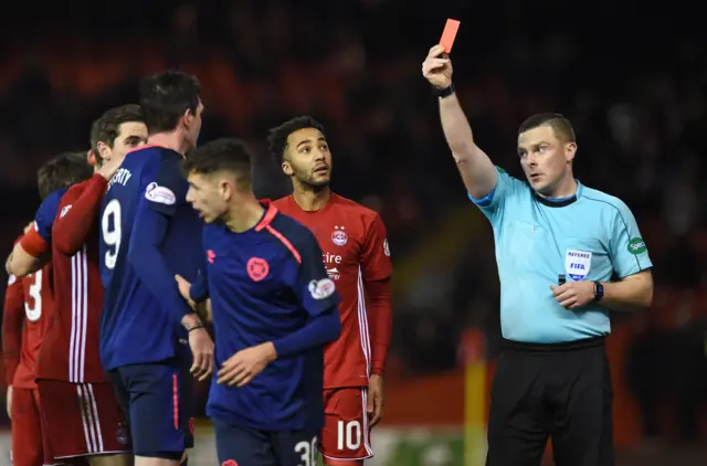 Referee John Beaton sends off Hearts striker Kyle Lafferty