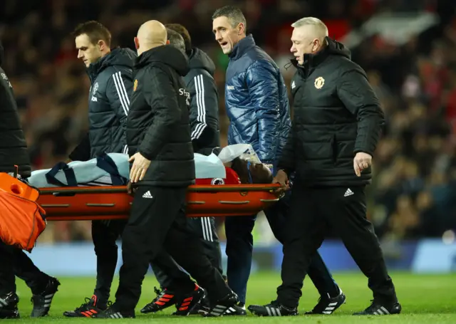 Lukaku stretchered off