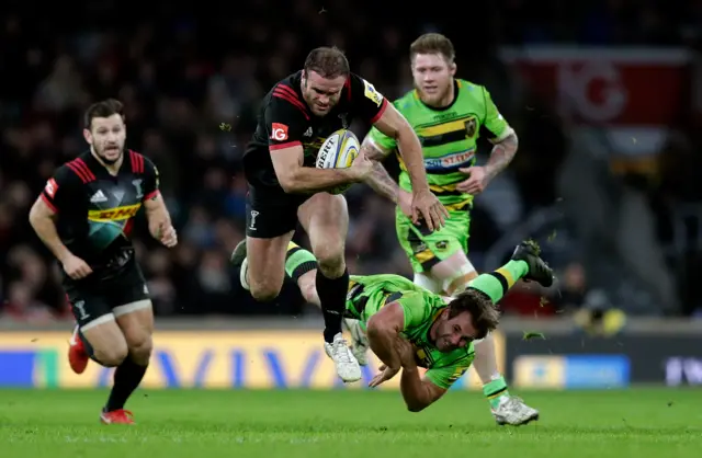 Jamie Roberts crashes through an attempted tackle