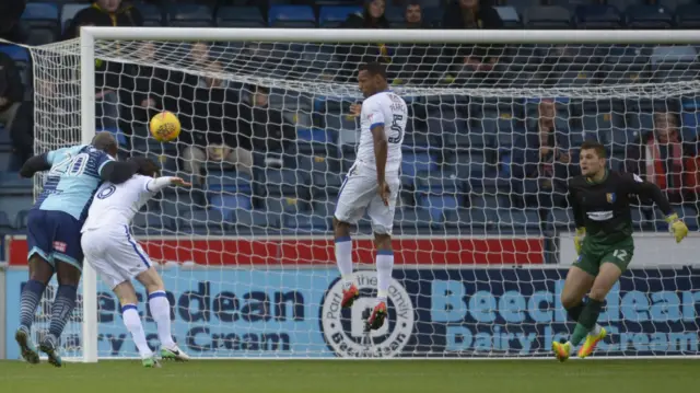 Adebayo Akinfenwa scores against Mansfield