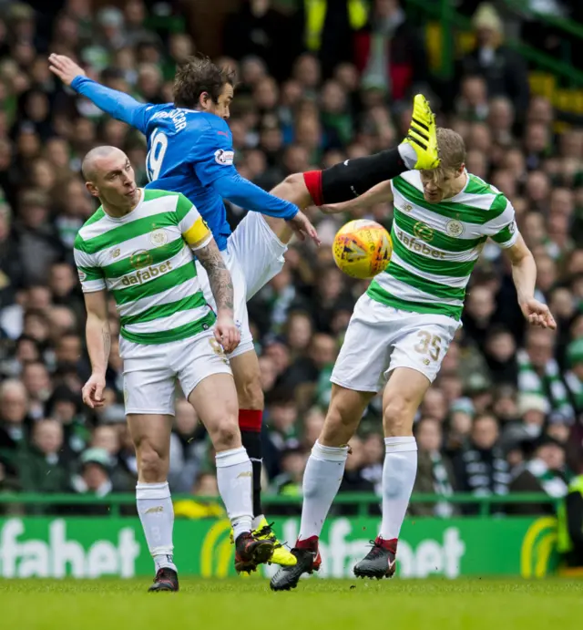 Niko Kranjcar is crowded out by Celtic's Scott Brown and Kristoffer Ajer