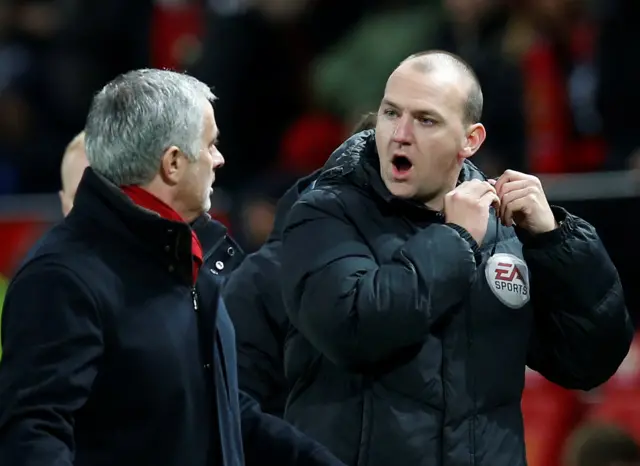 Jose Mourinho and fourth official Bobby Madeley