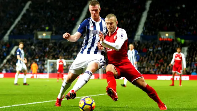 Chris Brunt challenges Jack Wilshire