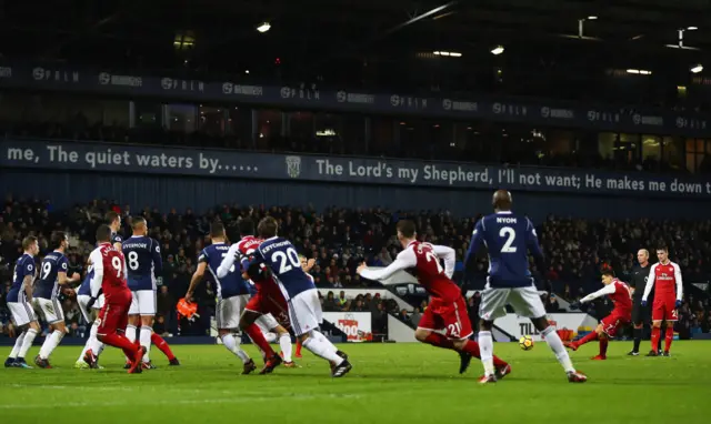 Arsenal open the scoring from Alexis Sanchez's deflected free-kick