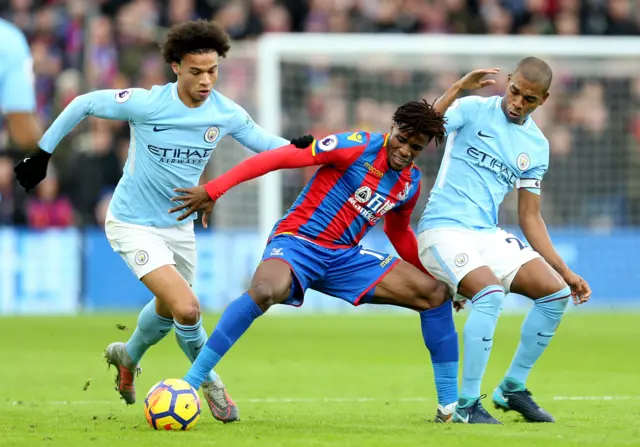 Leroy Sane challenges Wilfried Zaha