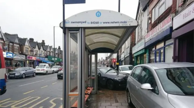 Car parked in bus stop