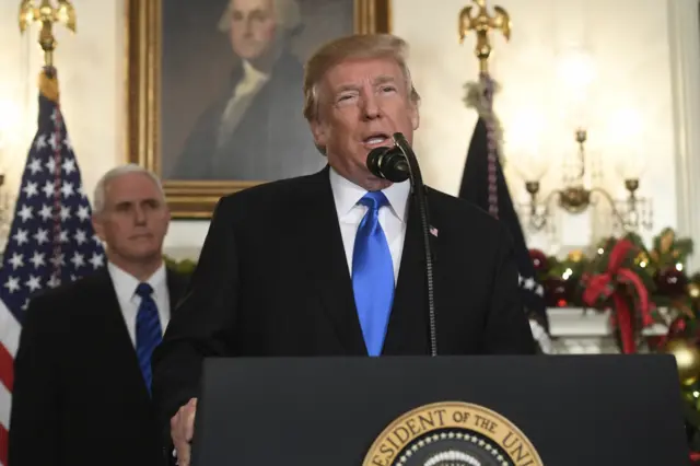 US President Donald Trump delivers a statement on Jerusalem from the Diplomatic Reception Room of the White House in Washington, DC, 6 December 2017