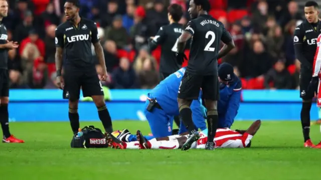 Bruno Martins Indi lying injured during Swansea game