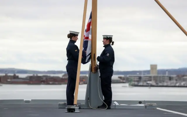 Royal Navy ratings practise in the hanger of HMS Queen Elizabeth