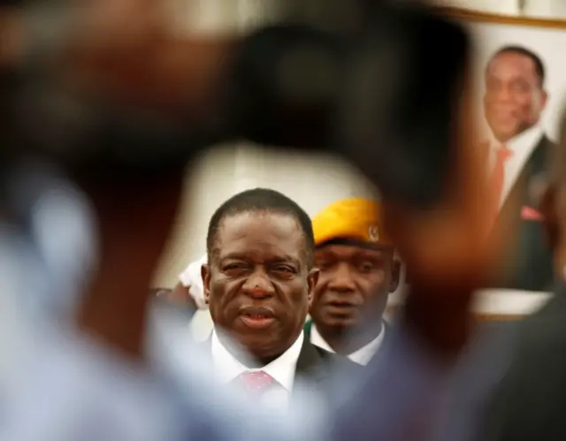 Zimbabwean President Emmerson Mnangagwa officiates at the swearing in ceremony for his cabinet at State House in Harare, Zimbabwe December 4, 2017.