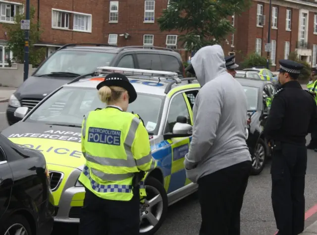 Police making arrest in London in 2013