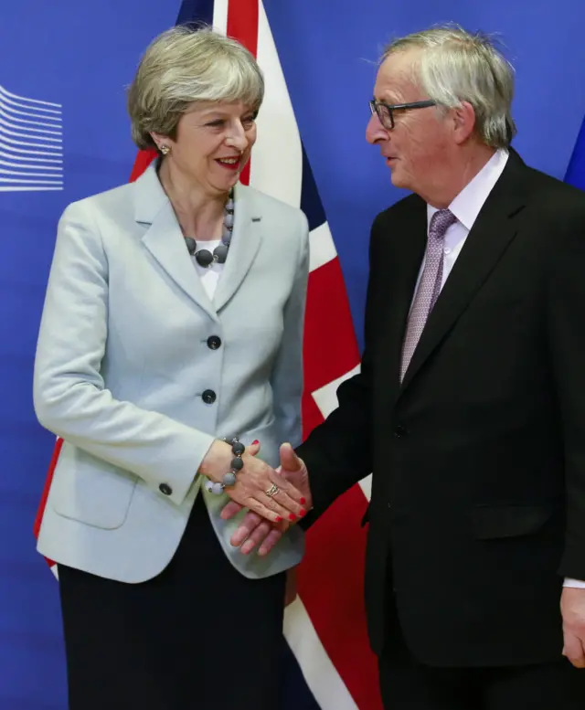 May/Juncker handsake