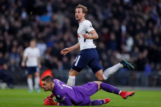 Kane reacts after missing goal