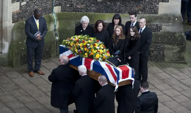 Family of Graham Taylor outside the church