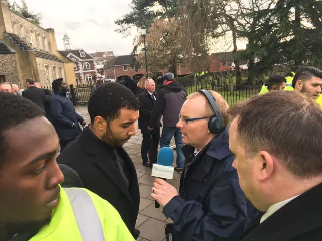 Troy Deeney talking to Simon Oxley