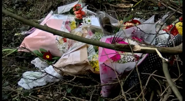 Flowers left at site of crash