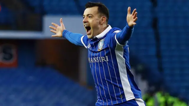 Sheffield Wednesday midfielder Ross Wallace celebrates scoring against Huddersfield