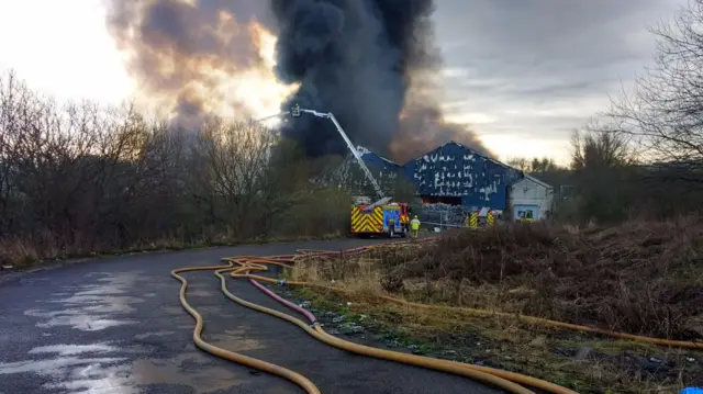 Fire crews on Sunday at the blaze