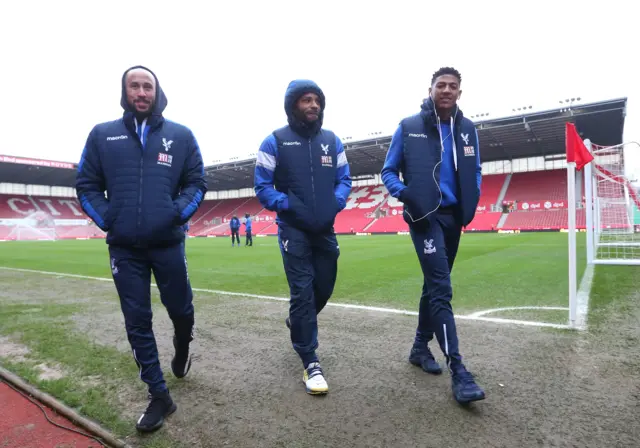 Crystal Palace's Andros Townsend, Jason Puncheon and Patrick van Aanholt take to the pitch ahead of today's game at Stoke