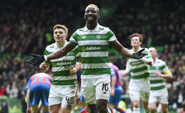 Moussa Dembele celebrates making it 2-0