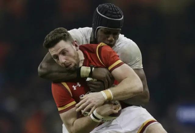 Alex Cuthbert is tackled by Maro Itoje